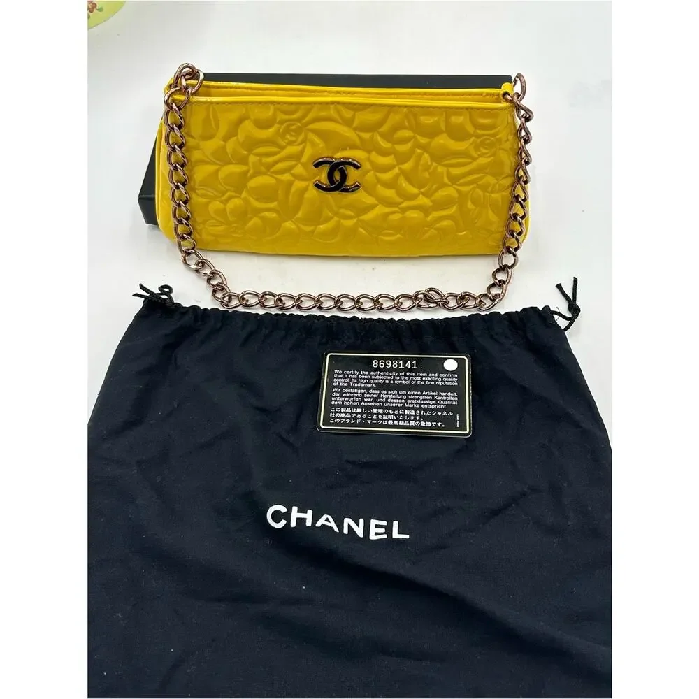 Women's Chanel patent leather floral embossed shoulder bag made in Italy